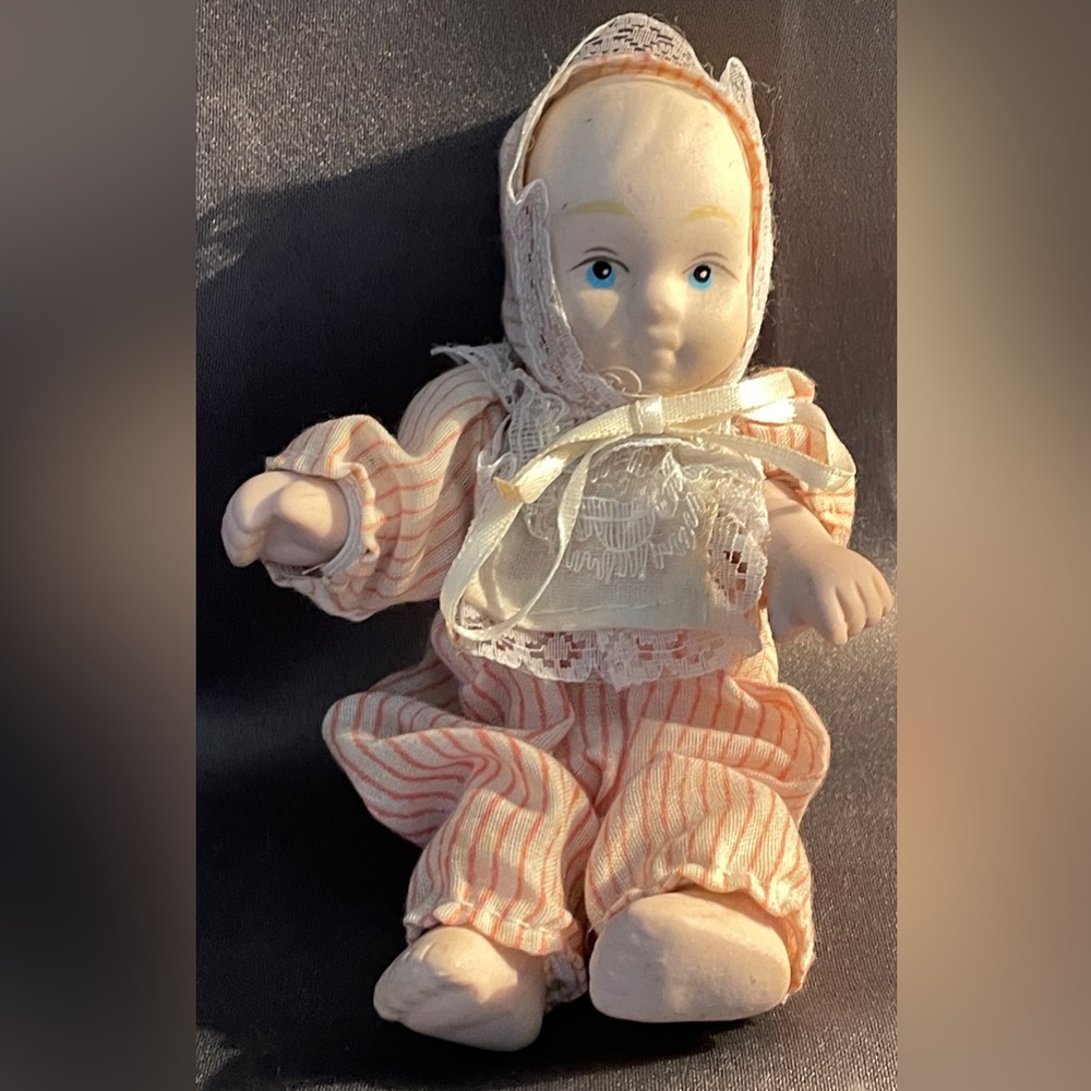 Vintage Porcelain Doll 4” High in Seated Position